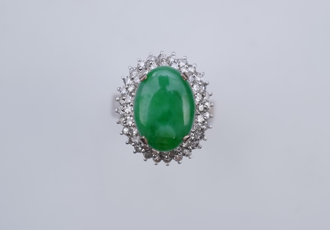 A jadeite and diamond ring